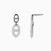 The 925 Sterling Silver Diamond Interlocking Link Earrings feature oval-shaped drops outlined with sparkling stones, each joined to a smaller oval loop for added diamond-inspired elegance.