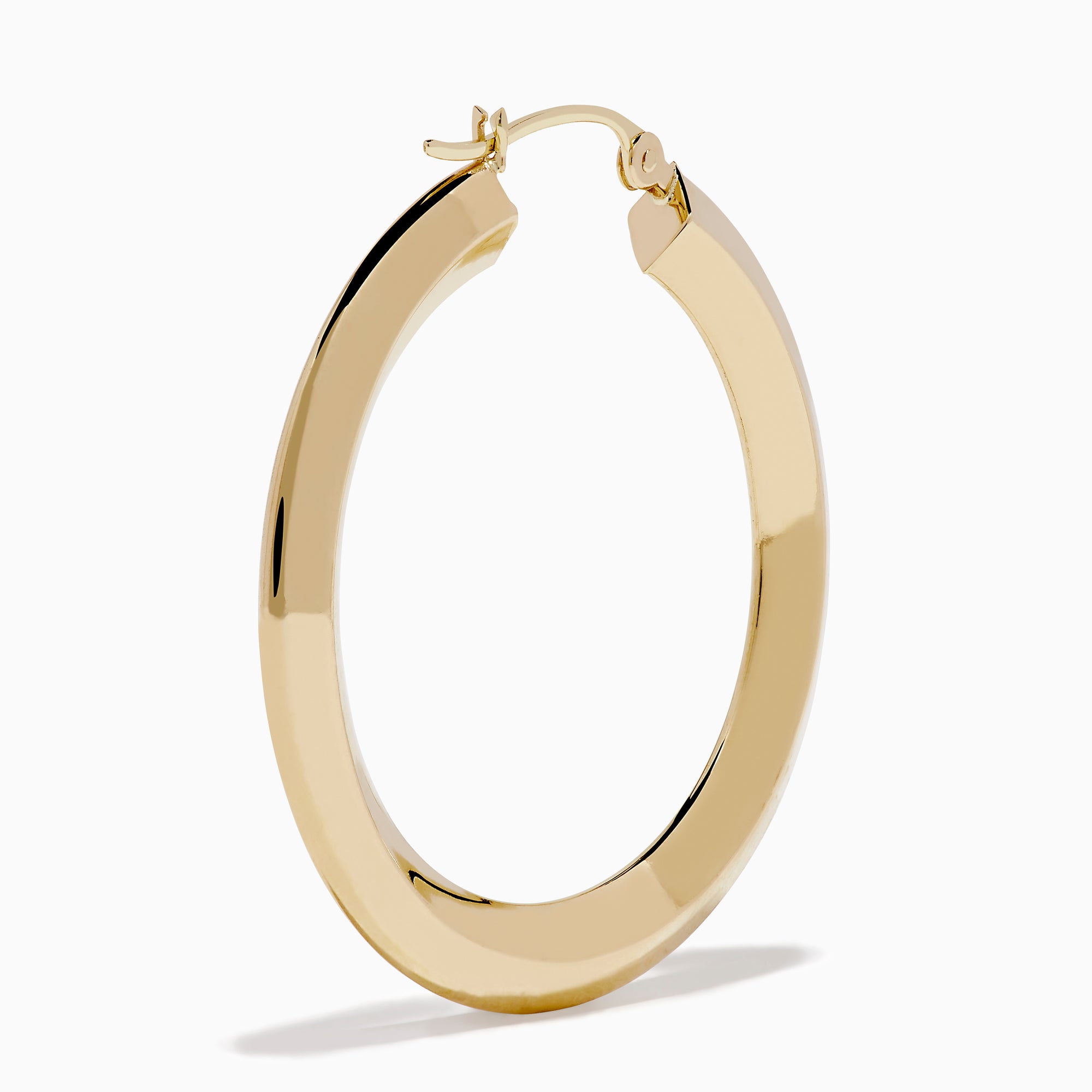 A pair of 14K Yellow Gold Rhombus Tube Hoop Earrings with a shiny, geometric shape, displayed on a white background.
