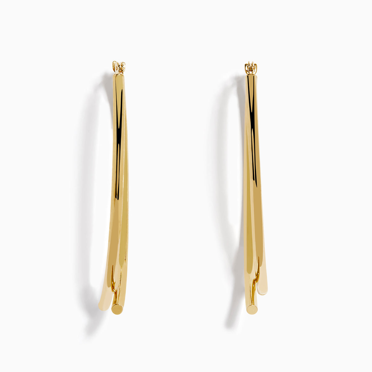 The 14K Yellow Gold Hollow Bypass Hoop Earrings feature two parallel strands in a sleek drop design with a smooth, shiny finish, elegantly displayed against a white background.