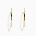 The 14K Yellow Gold Large Tube Hoop Earrings feature a simple, polished design, displayed on a plain white background with subtle shadows.