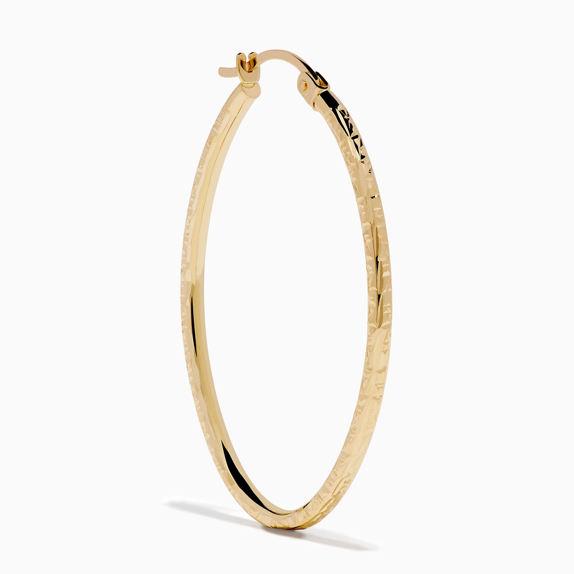 A pair of 14K Yellow Gold Oval Tube Baguette Cut Hoop Earrings, thin and textured, are displayed vertically with clasps at the top against a plain white background.