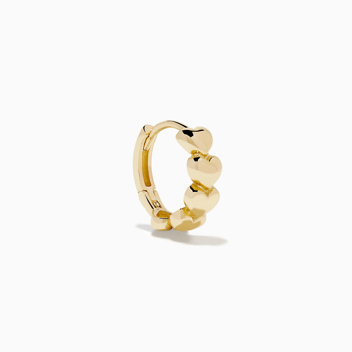 The 14K Yellow Gold Polished Heart Huggie Hoop Earrings feature a vertical row of shiny heart-shaped segments, elegantly displayed against a plain white background.