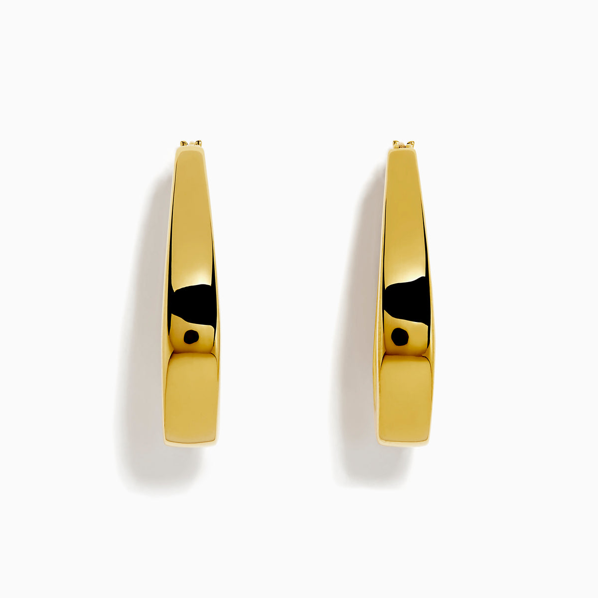 The 14K Yellow Gold Oval Hoop Earrings feature a sleek, modern tapered flat-edge design and are displayed against a white background.