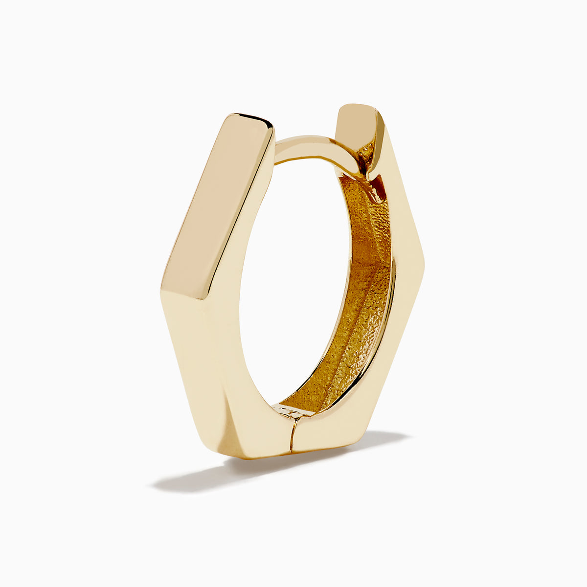 A pair of minimalist 14K Yellow Gold Hexagon Huggies displayed upright on a plain white background.