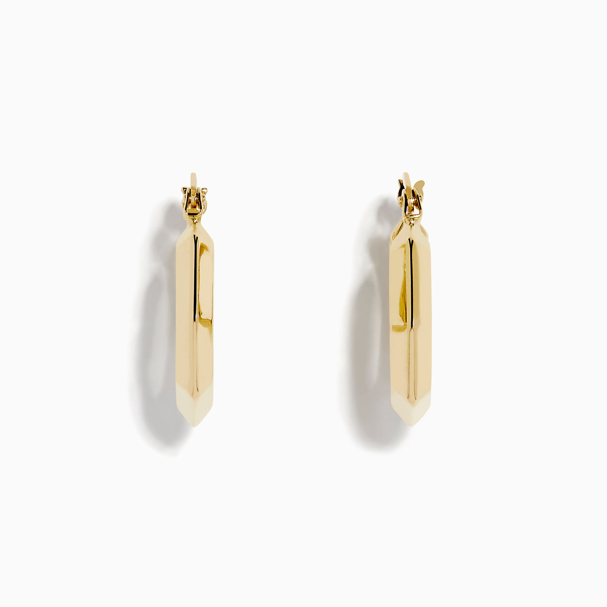 The 14K Yellow Gold Geometric Hoops feature a faceted, hexagonal design and are shown upright against a plain white background.