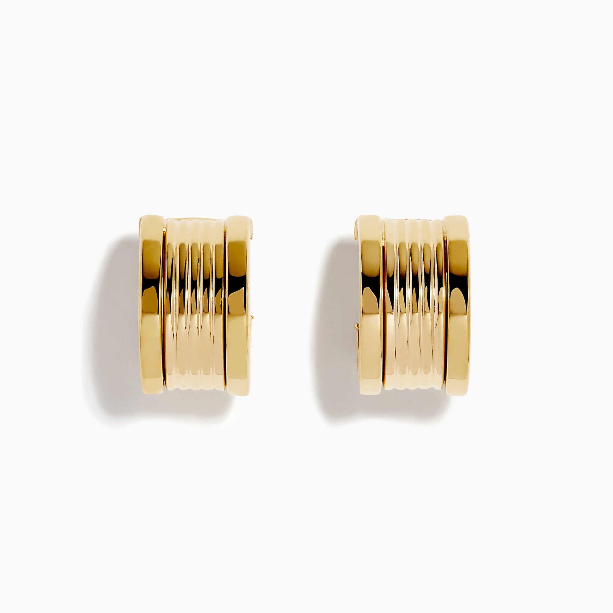The 14K Yellow Gold Chunky Huggie Earrings feature a ridged, cylindrical design and are shown against a white background.