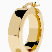 The 14K Yellow Gold Rectangular Bold Huggie Earrings feature smooth, polished surfaces and a shiny finish, shown against a plain white background.