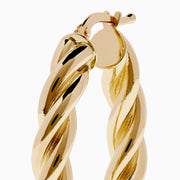 A pair of 14K Yellow Gold Twist Tube Oblong Earrings displayed on a plain white background.
