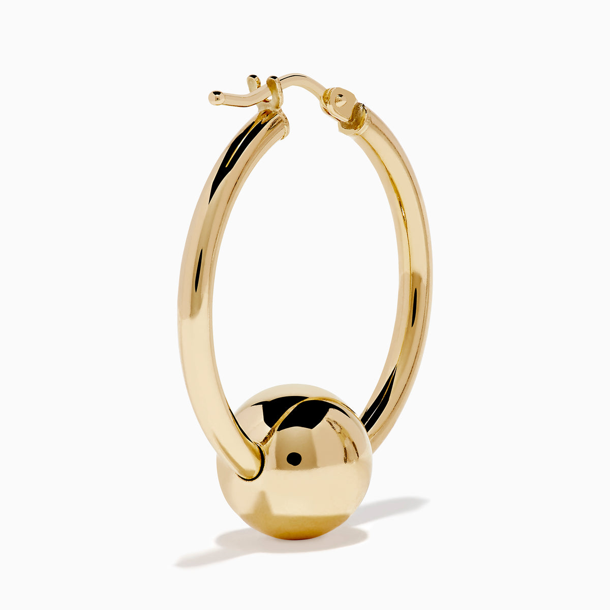 A pair of 14K yellow gold tube hoops with bead accents, displayed against a plain white background.
