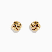 The 14K Yellow Gold Love Knot Stud Earrings are shown on a plain white background, highlighting their shiny finish.