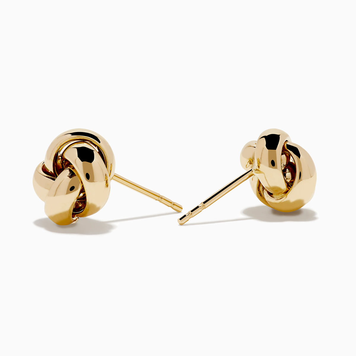 The 14K Yellow Gold Love Knot Stud Earrings are shown on a plain white background, highlighting their shiny finish.