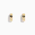 The 14K Yellow Gold Huggies are simple, small earrings with a smooth, shiny finish, shown on a plain white background.