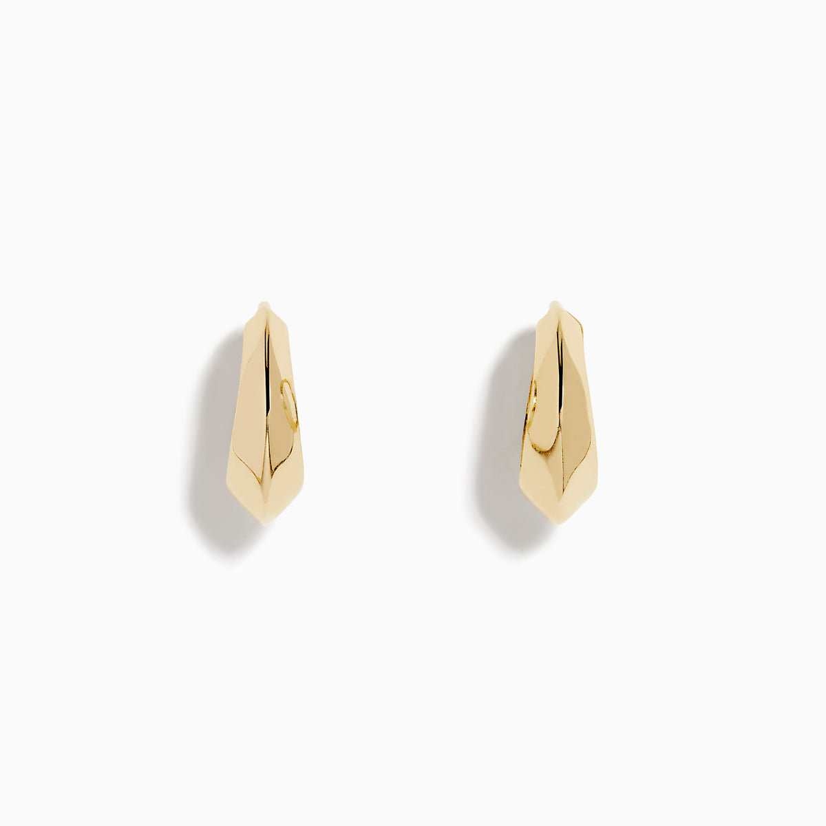 The 14K Yellow Gold Knife Edge Huggie Earrings feature a small, geometric design with sleek angles, shown against a plain white background.