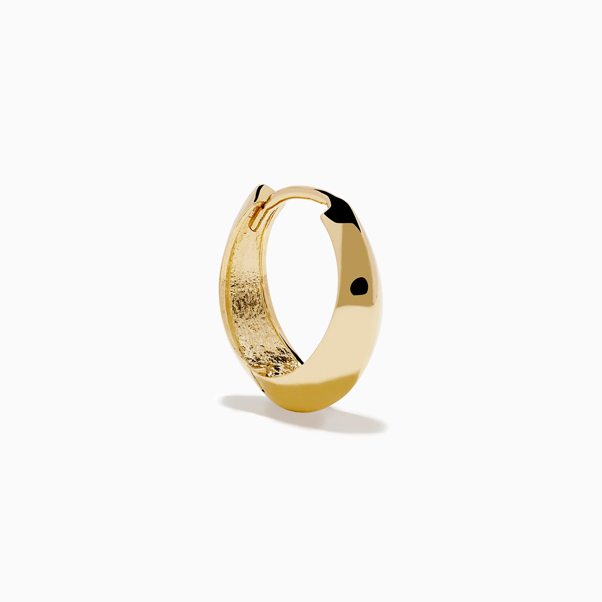 The 14K Yellow Gold Knife Edge Huggie Earrings feature a small, geometric design with sleek angles, shown against a plain white background.
