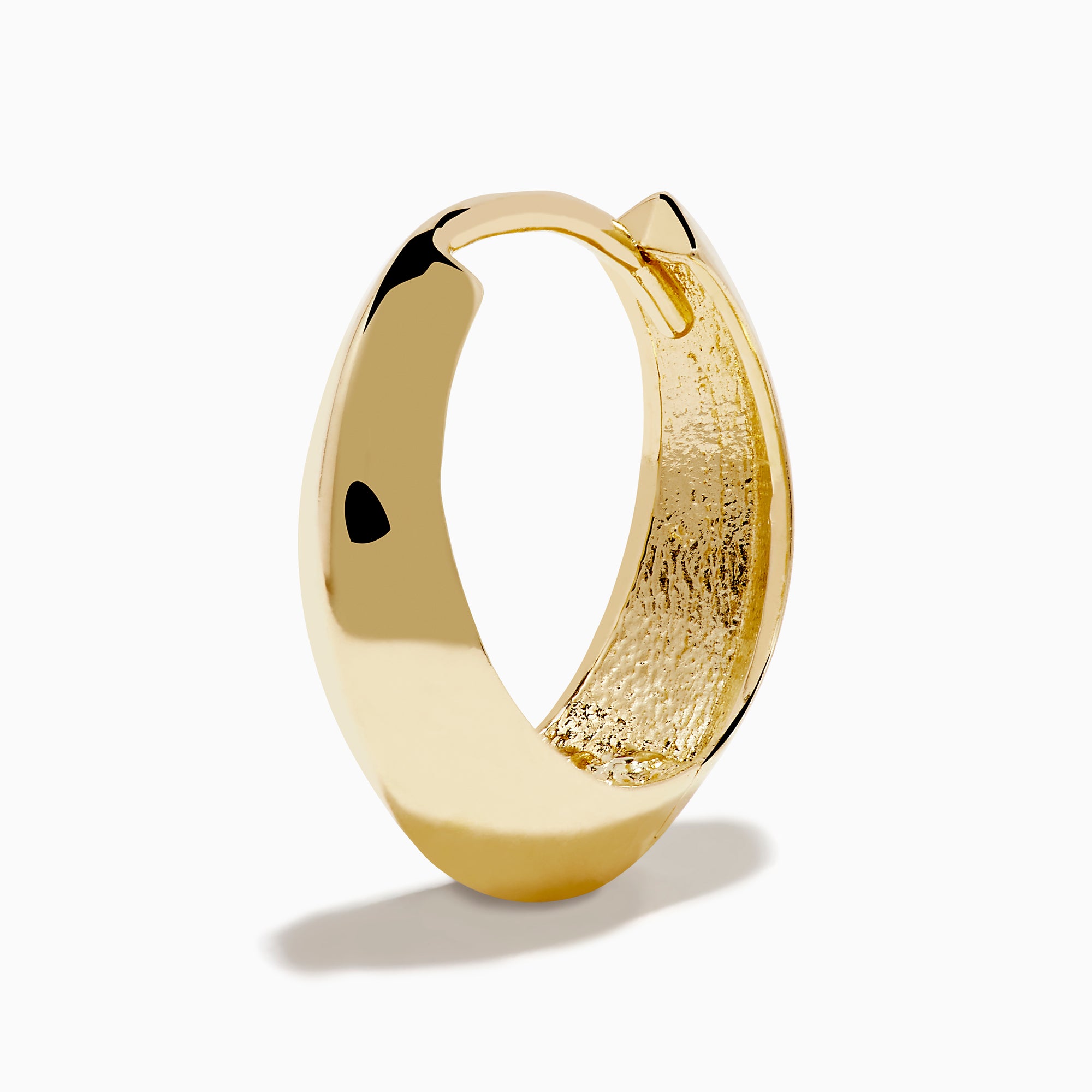 The 14K Yellow Gold Knife Edge Huggie Earrings feature a small, geometric design with sleek angles, shown against a plain white background.