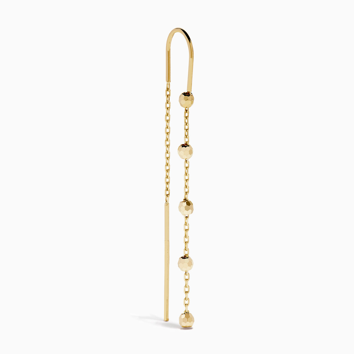 The 14K Yellow Gold Linear Drop Earrings showcase a minimalist design with slim chains and small, spaced gold beads. Crafted in 14K yellow gold, these earrings hang vertically from hooks for a timeless, elegant style.
