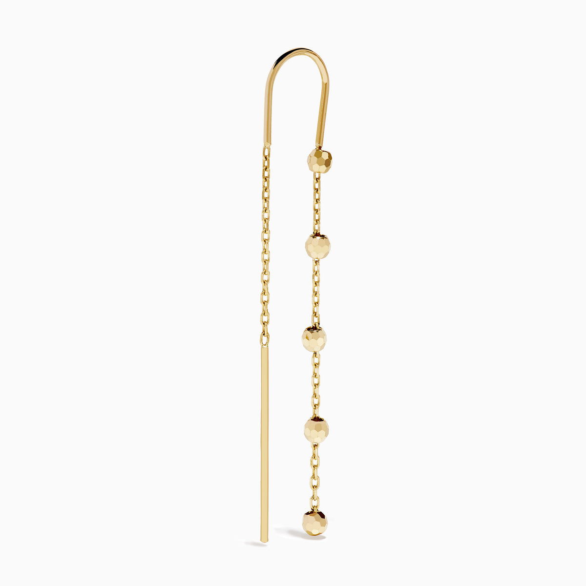 The 14K Yellow Gold Linear Drop Earrings showcase a minimalist design with slim chains and small, spaced gold beads. Crafted in 14K yellow gold, these earrings hang vertically from hooks for a timeless, elegant style.