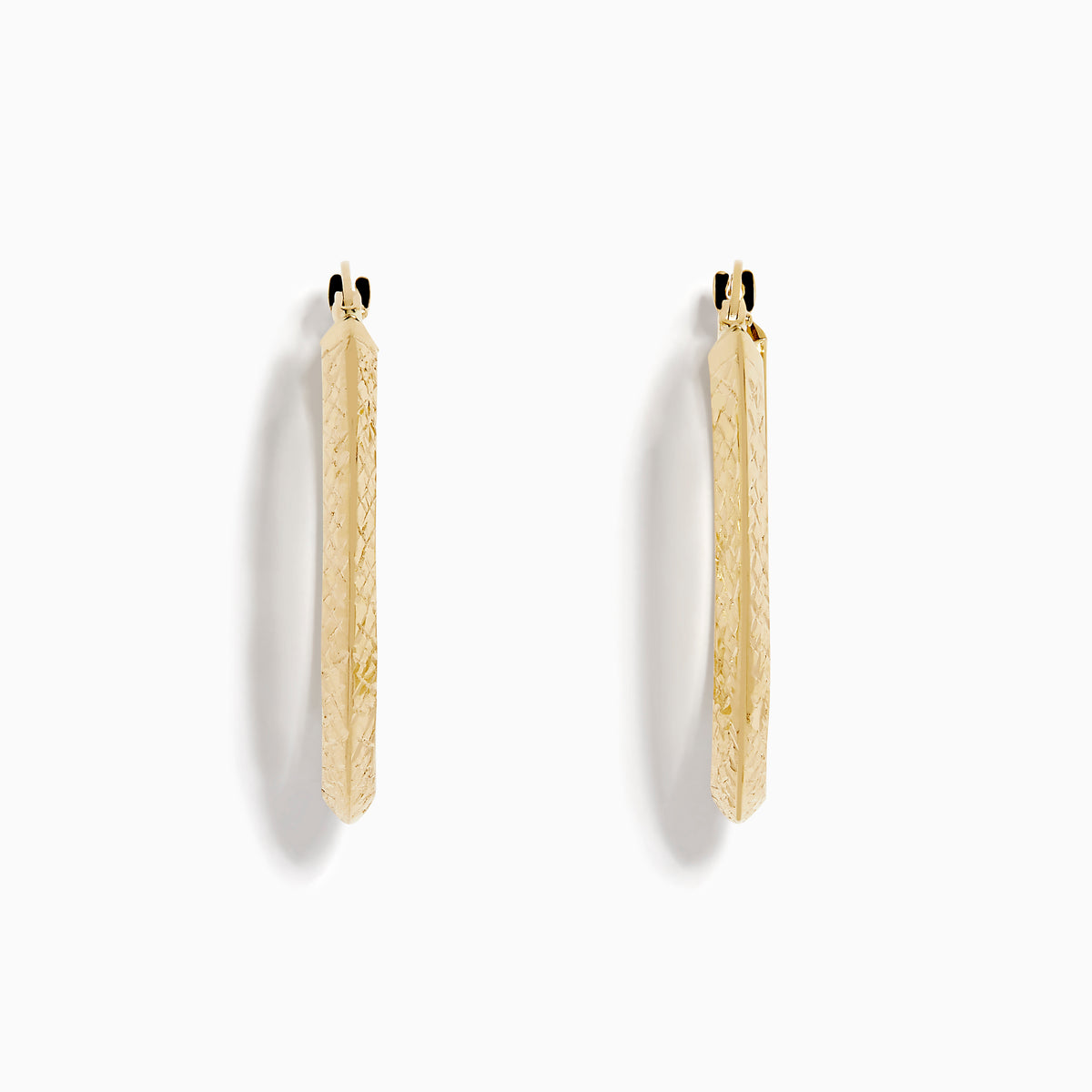 A pair of 14K Yellow Gold Knife Edge Tube Hoop Earrings with a textured finish, displayed on a plain white background and shown facing forward with visible clasps at the top.