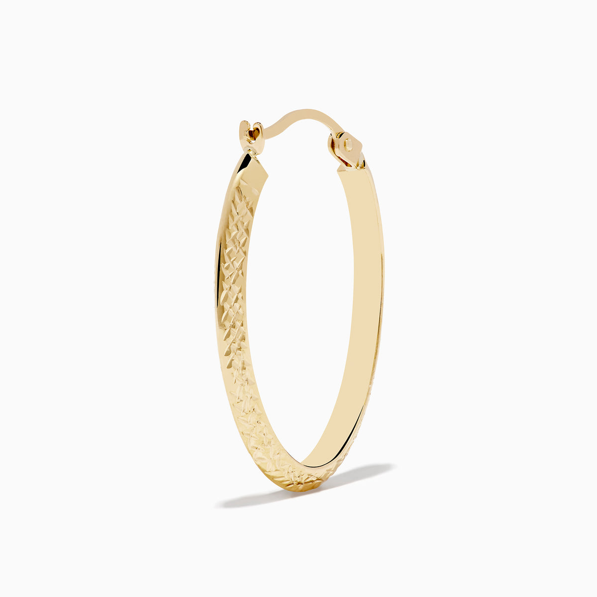 A pair of 14K Yellow Gold Knife Edge Tube Hoop Earrings with a textured finish, displayed on a plain white background and shown facing forward with visible clasps at the top.
