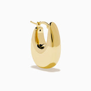 The 14 Karat Yellow Gold Chunky Oval Hoop Earrings feature a shiny finish and smooth, rounded edges, shown against a white background.