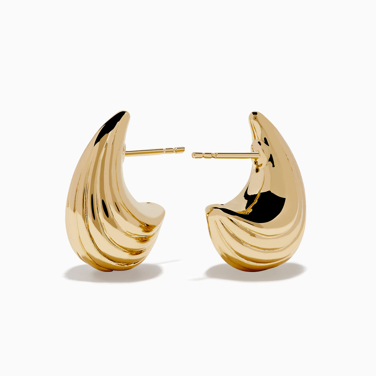 A pair of 14K yellow gold shrimp stud earrings, gleaming against a plain white background.