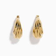 The 14K Yellow Gold Shrimp Hoop Earrings feature a twisted, sculptural teardrop design and are displayed on a white background.