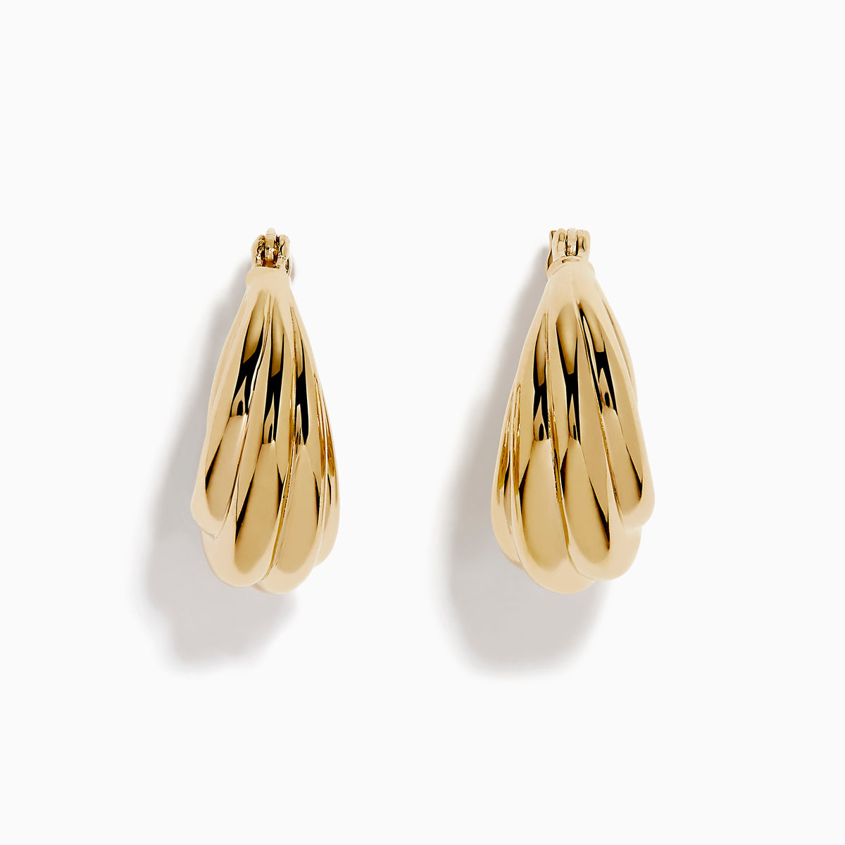The 14K Yellow Gold Shrimp Hoop Earrings feature a twisted, sculptural teardrop design and are displayed on a white background.