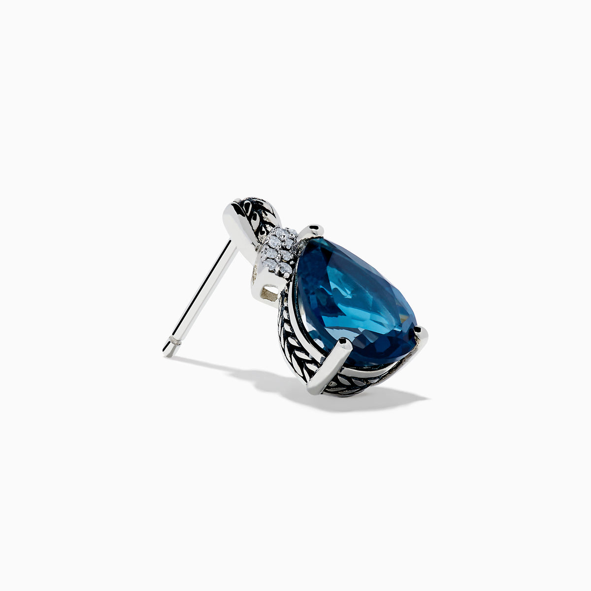 The Ocean Bleu 925 Sterling Silver London Blue Topaz and Diamond Earrings showcase teardrop-shaped London Blue Topaz stones, accented with sparkling diamonds and a leaf-patterned sterling silver setting.