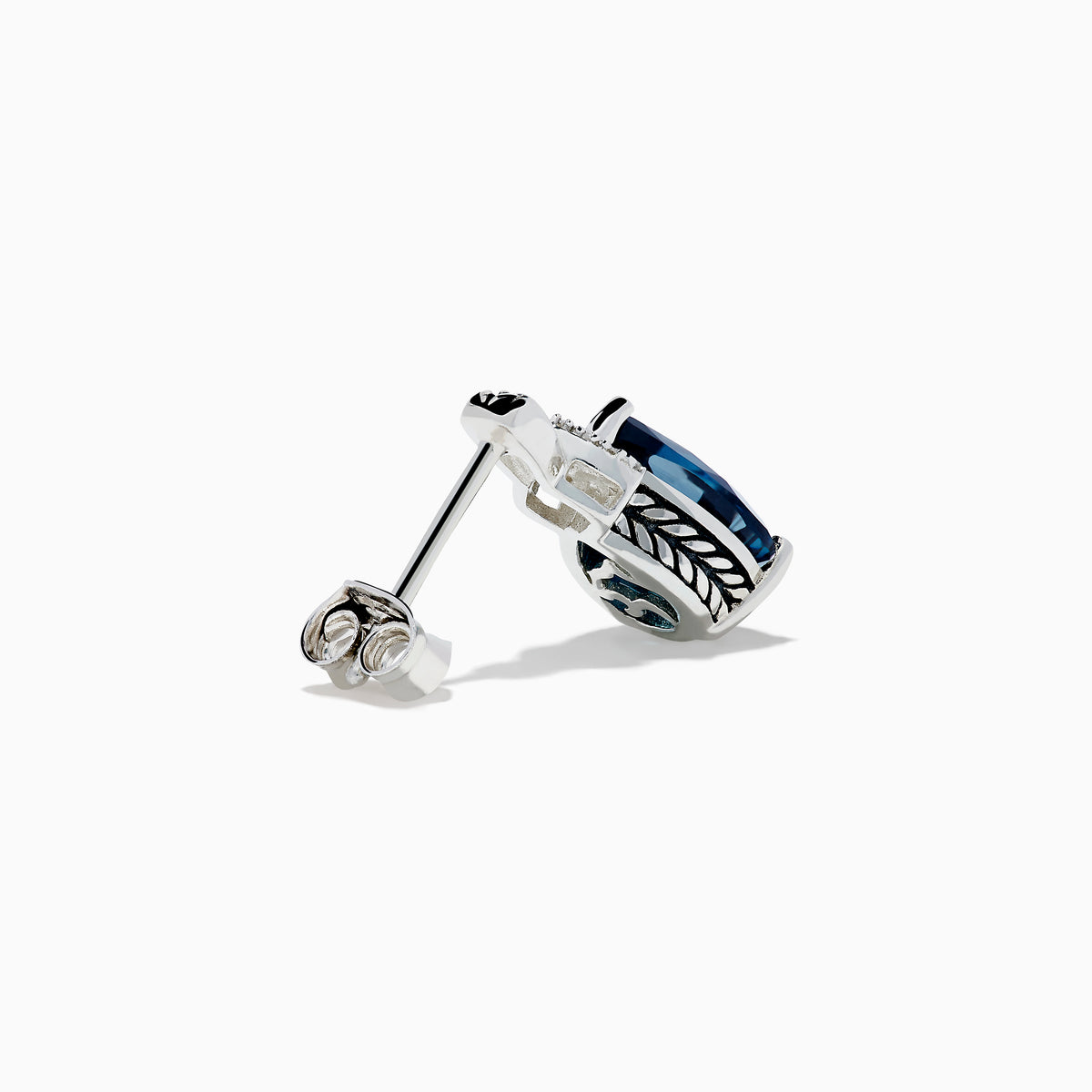 The Ocean Bleu 925 Sterling Silver London Blue Topaz and Diamond Earrings showcase teardrop-shaped London Blue Topaz stones, accented with sparkling diamonds and a leaf-patterned sterling silver setting.