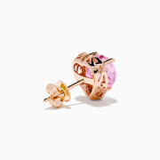 The 14K Rose Gold Kunzite and Diamond Heart Earrings feature pink kunzite centers, each bordered by sparkling diamonds—an elegant choice for fans of heart-shaped stud earrings.