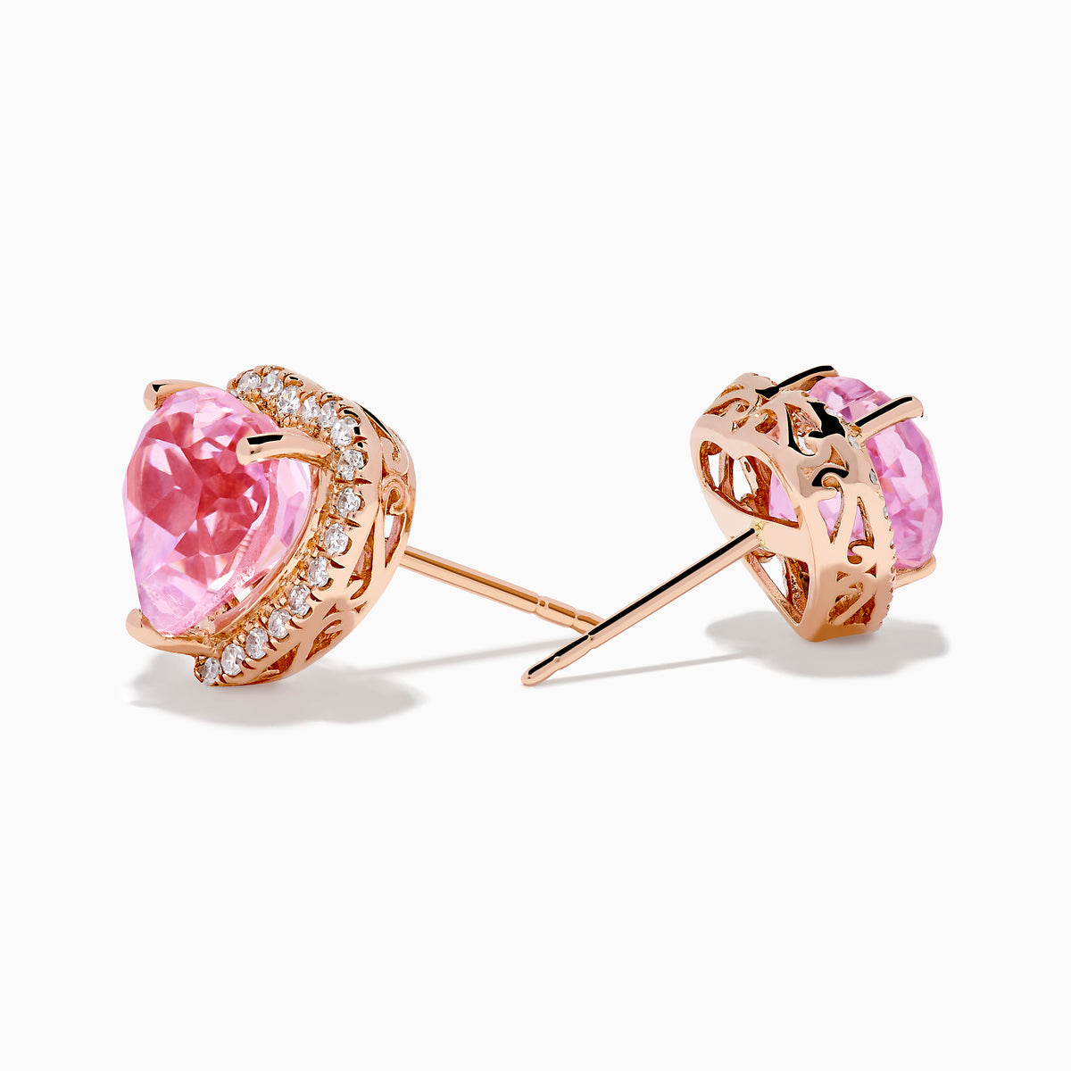 The 14K Rose Gold Kunzite and Diamond Heart Earrings feature pink kunzite centers, each bordered by sparkling diamonds—an elegant choice for fans of heart-shaped stud earrings.