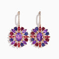 The 14K Rose Gold Mix Stone and Diamond Floral Drop Earrings feature oval and marquise purple, pink, red, and blue stones in a floral pattern with diamond accents on the hooks.