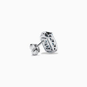 The 14K White Gold Elongated Cushion Blue Topaz and Diamond Halo Stud Earrings feature rectangular blue topaz stones encircled by shimmering diamonds for a timeless, elegant look.