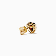 The 14K Yellow Gold Garnet and Diamond Halo Heart Stud Earrings feature deep red heart-shaped garnets at the center, each surrounded by a sparkling diamond halo, all set in yellow gold.