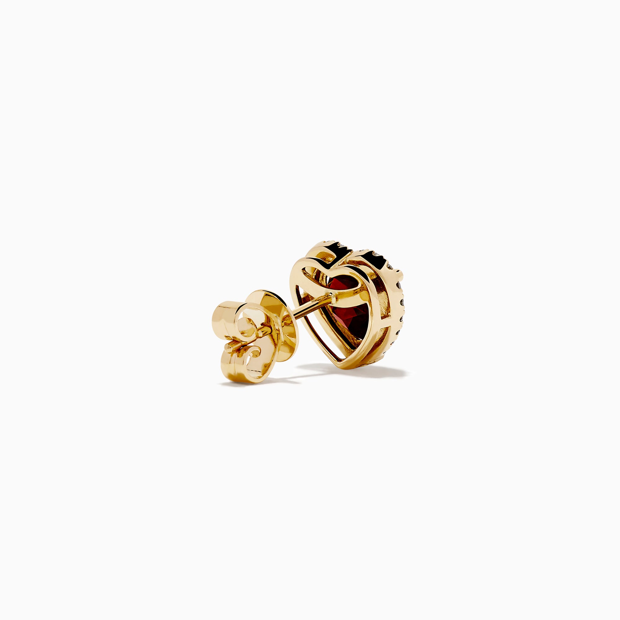 The 14K Yellow Gold Garnet and Diamond Halo Heart Stud Earrings feature deep red heart-shaped garnets at the center, each surrounded by a sparkling diamond halo, all set in yellow gold.