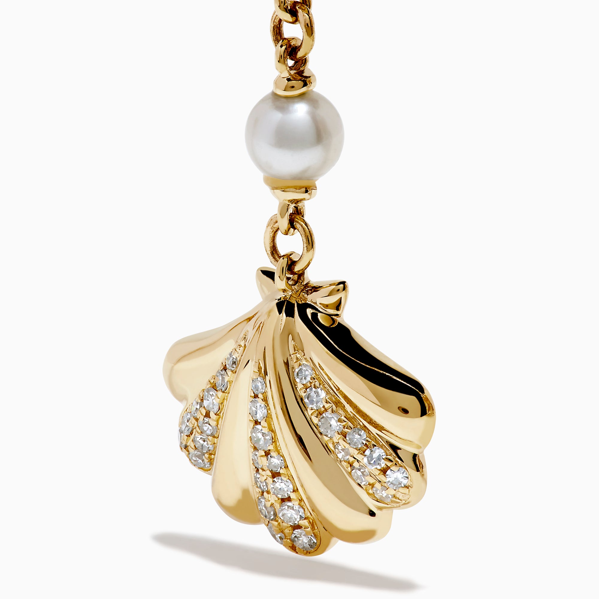 The 14K Yellow Gold Freshwater Pearl and Diamond Drop Seashell Earrings feature shell designs, diamond accents, and four round freshwater pearls linked by a chain.