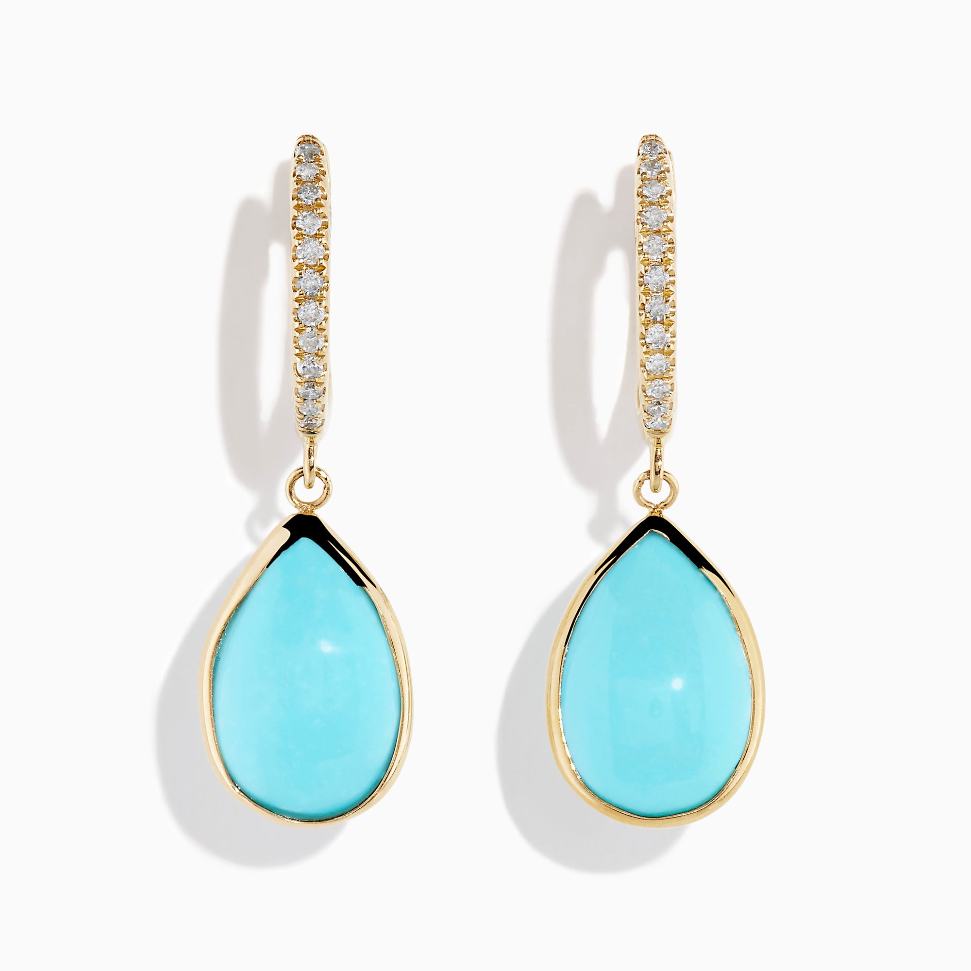 The 14K Yellow Gold Turquoise and Diamond Drop Earrings feature teardrop turquoise stones and sparkling diamonds along the hooks, shown on a white background.