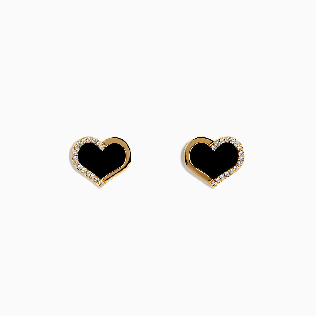 The Eclipse 14K Yellow Gold Onyx and Diamond Heart Earrings feature heart-shaped studs with black onyx centers and a border of sparkling diamonds, displayed on a plain white background.