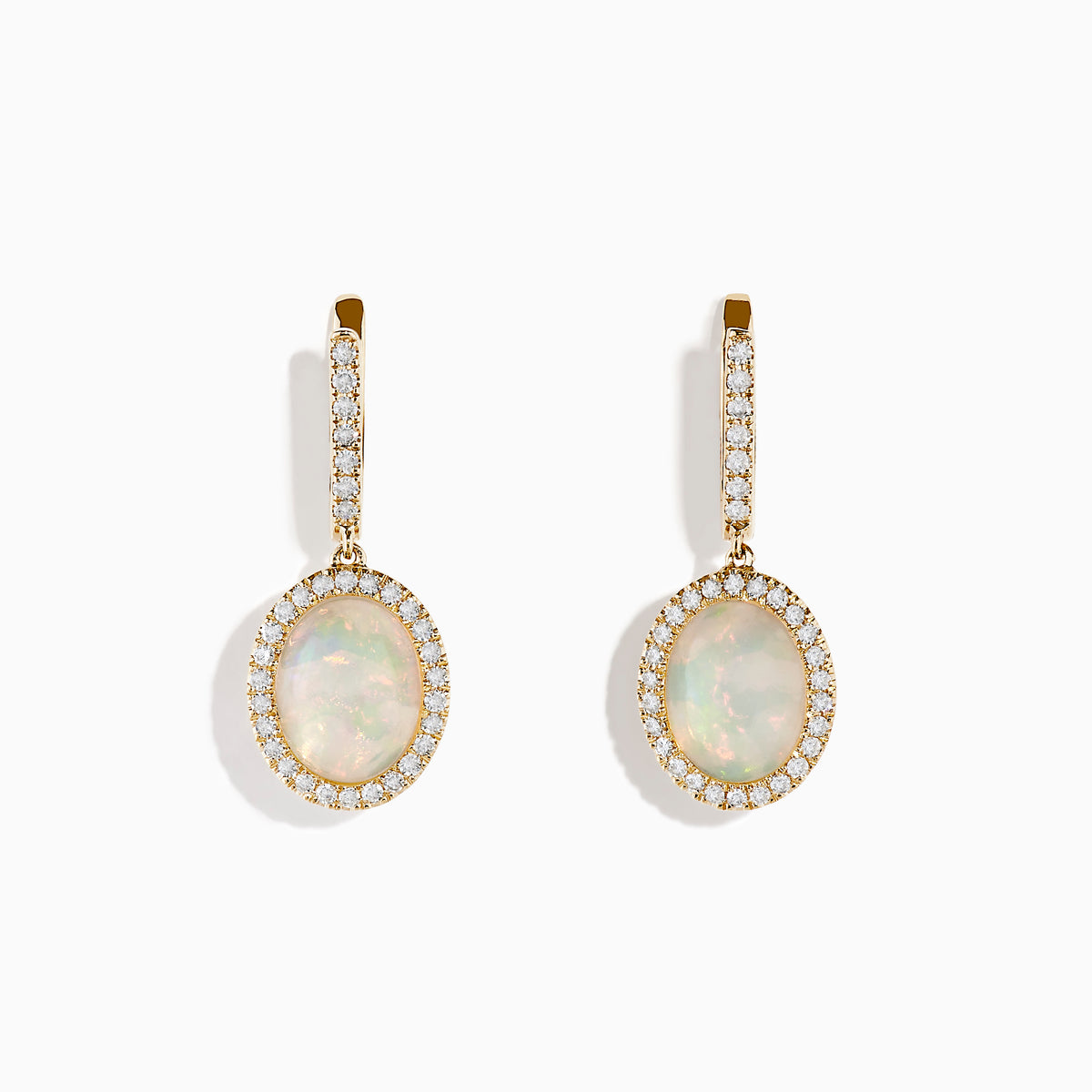 The 14K Yellow Gold Opal and Diamond Drop Earrings feature oval opal gemstones framed by sparkling diamonds, with additional diamond accents on the gold hoops and drops, creating an elegant look against a white background.