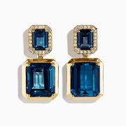 14K Yellow Gold Emerald-Cut Blue Topaz and Diamond Drop Earrings feature large rectangular blue topaz stones topped with smaller gems, both outlined by sparkling clear diamonds, displayed on a white background.