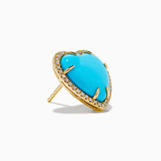 The 14K Yellow Gold Turquoise and Diamond Heart Earrings feature heart-shaped turquoise accented by a border of sparkling diamonds, all set in yellow gold and displayed on a white background.