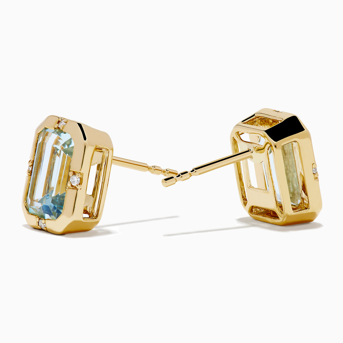 A pair of 14K Yellow Gold Bezel Set Aquamarine and Diamond Stud Earrings showcasing large emerald-cut light blue aquamarines and small round diamond accents at each corner, presented against a white background.