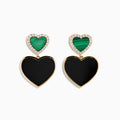 The 14K Yellow Gold Onyx, Malachite and Diamond Heart Dangle Earrings showcase small green malachite hearts with diamond accents above larger black onyx hearts, all set in elegant yellow gold.