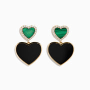 The 14K Yellow Gold Onyx, Malachite and Diamond Heart Dangle Earrings showcase small green malachite hearts with diamond accents above larger black onyx hearts, all set in elegant yellow gold.