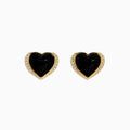 14K Yellow Gold Onyx and Diamond Heart Stud Earrings with black onyx centers and a line of sparkling diamonds along one side, shown against a white background.