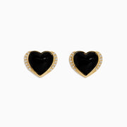 14K Yellow Gold Onyx and Diamond Heart Stud Earrings with black onyx centers and a line of sparkling diamonds along one side, shown against a white background.