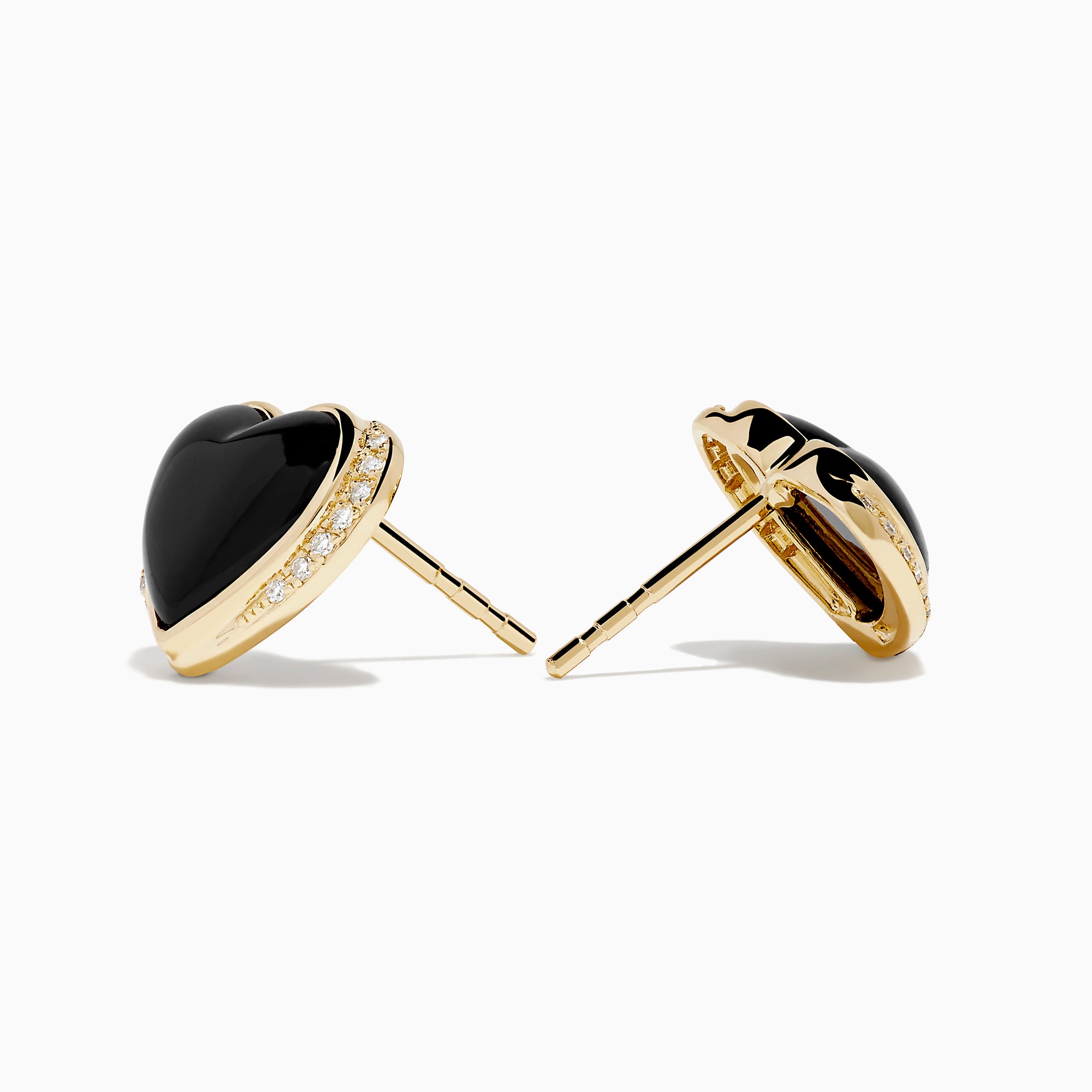 14K Yellow Gold Onyx and Diamond Heart Stud Earrings with black onyx centers and a line of sparkling diamonds along one side, shown against a white background.