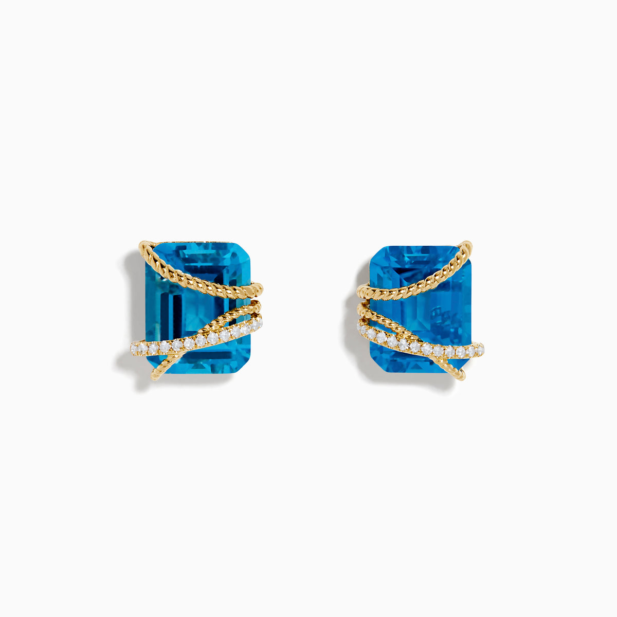 Ocean Bleu 14K Yellow Gold Blue Topaz and Diamond Earrings feature square-cut blue topaz stones with diamond-accented gold bands crisscrossing over them, shown on a plain white background.