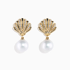 The 14K Yellow Gold Freshwater Pearl and Diamond Shell Drop Earrings feature a shell design with small diamonds and a large freshwater pearl drop, shown against a white background.