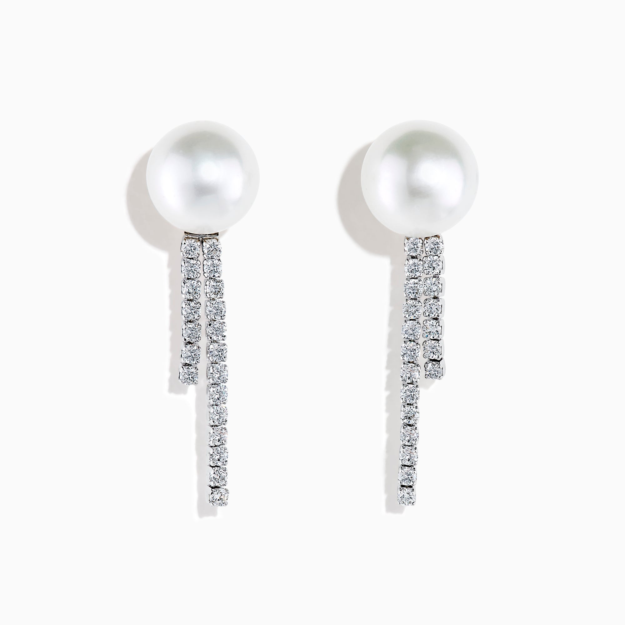 The 14K White Gold Cultured Pearl and Diamond Drop Earrings feature round cultured pearls atop two vertical rows of sparkling diamonds, all set against a plain white background.